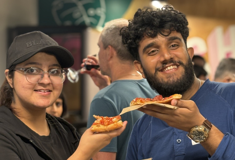 Students network at Migrants in Tech event 