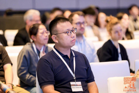 Senior lecturer presents AI research in Beijing